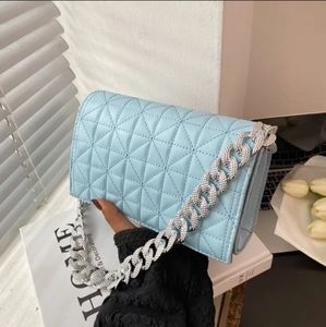 Quilted chain flap square bag